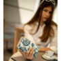 Kép 1/3 - Valódi bőr virágos női pénztárca kék színben